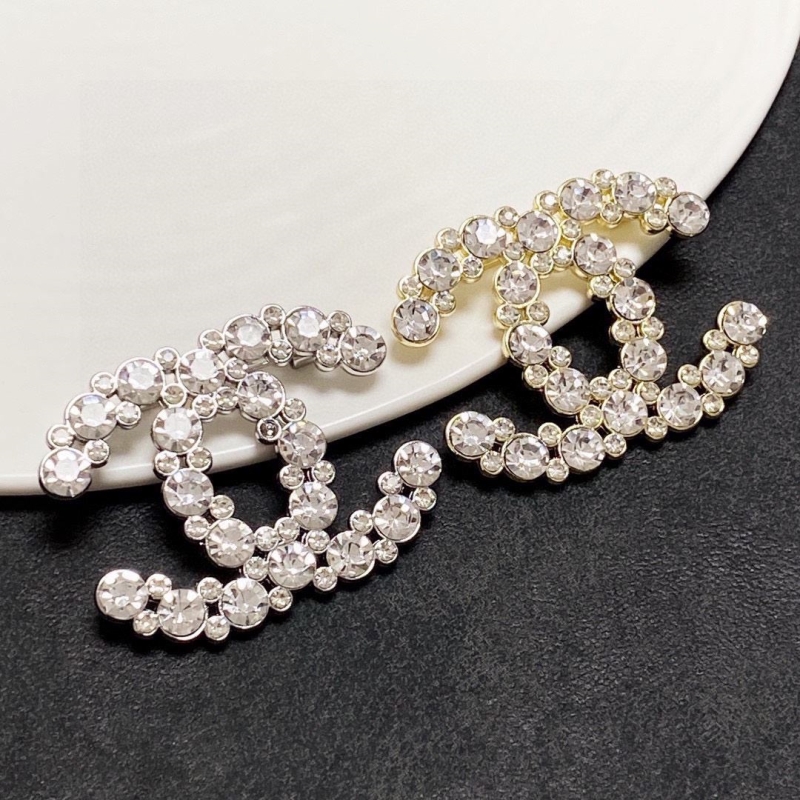 Ch**el brooches